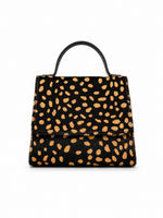 Black & Tan Spotted Haircalf Color